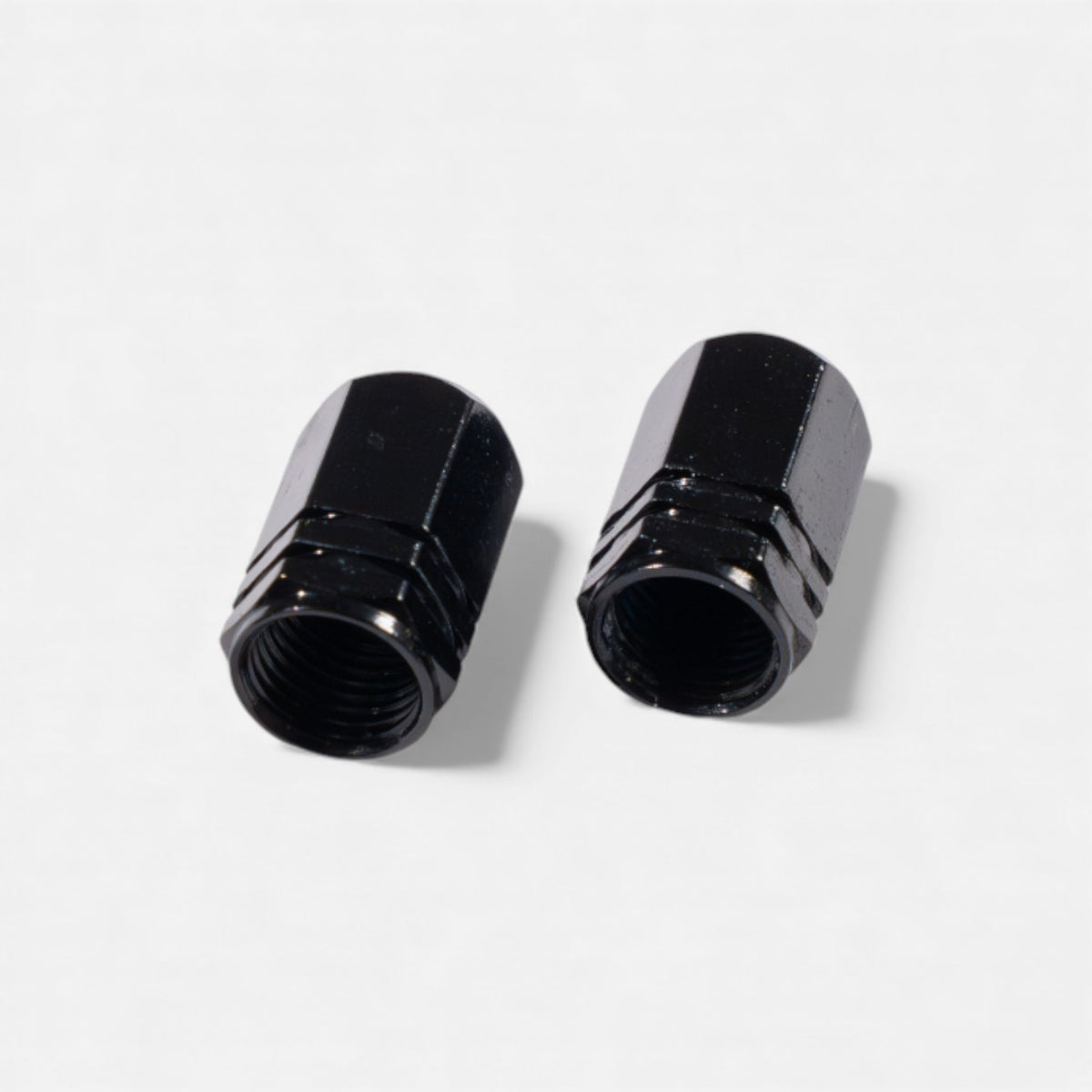 Bouchons de valve noirs en aluminium (x2) – Trottinette, vélo, voiture Wheellow